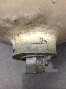 A close look showed Gentz that the plug had been hand machined and sported two holes for safety wires (Credits: Dean Gentz).